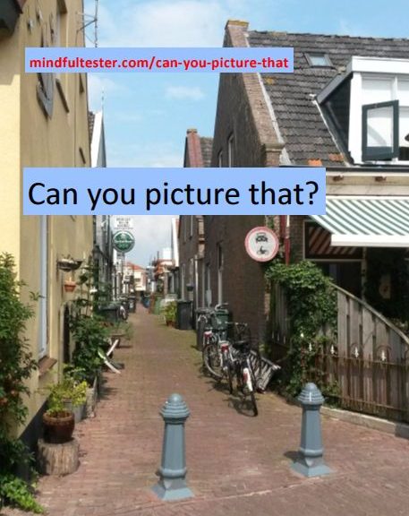 A narrow street with a traffic sign and poles to keep block cars. Showing texts “Can you picture that?” and “mindfultester.com/can-you-picture-that”!