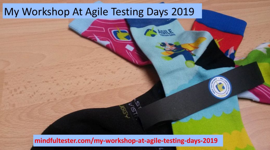 3 different Agile Testing Days Speaker s’ socks with a paper wrapper with the textes "My Workshop At Agile Testing Days 2019" and “mindfultester.com/my-workshop-at-agile-testing-days-2019”!